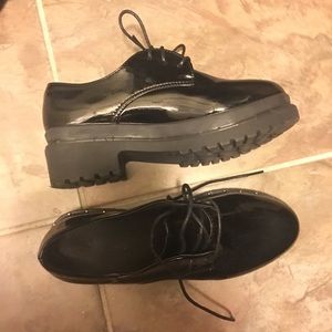 Studded patent leather oxfords